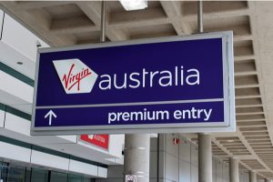 Virgin Australia logo with Premium Entry signage